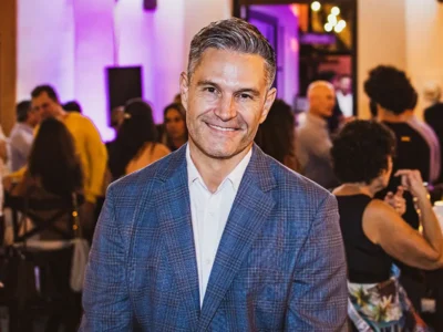 Ian Gengos at a real estate investment event in Los Cabos, featured in an interview with Monica Dallas on why and how to invest in Mexican real estate
